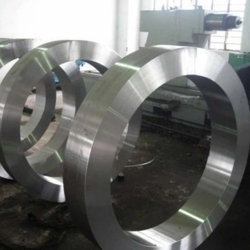 AISI D2 forged steel rings with machined surfaces, showcasing uniform grain flow and precise dimensional tolerances for industrial tooling applications.